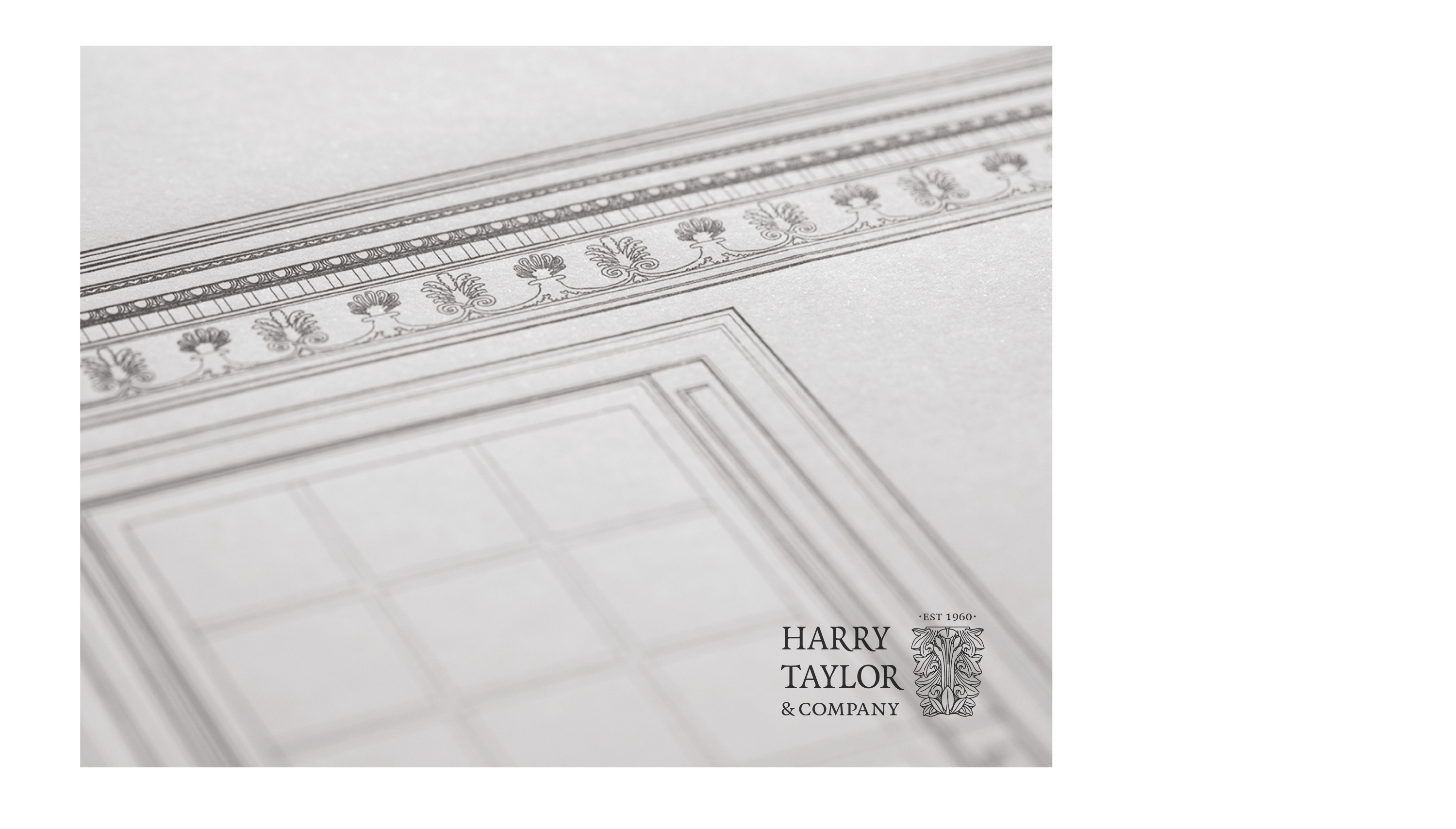 Harry Taylor logo sitting on drawing.