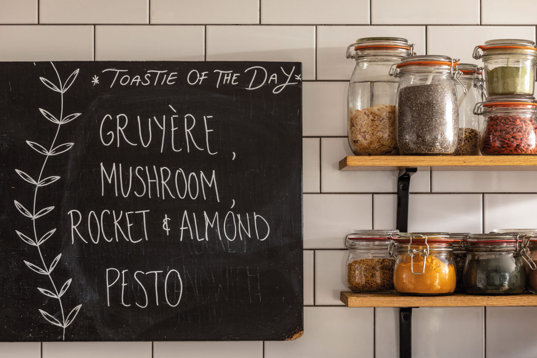 Urbanangel interior close up. Blackboard and jars of dried ingredients.